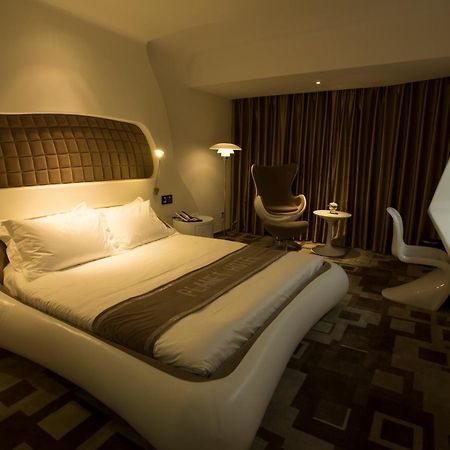 Guangzhou Planet Hotel Room photo
