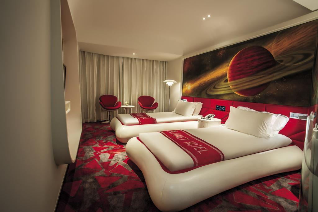 Guangzhou Planet Hotel Room photo